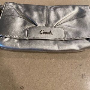Coach metallic wristlet.
